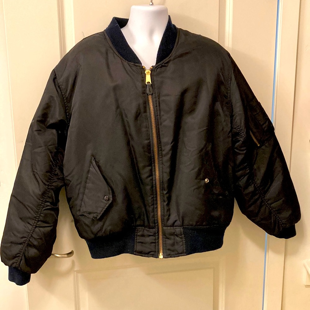 Classic reversible black  bomber jacket.